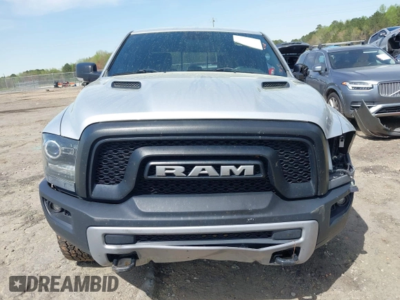 2015 Ram 1500 Rebel z VIN 1C6RR7YT0FS751334, wystawiony jako IAAI lot #41933040 z przebiegiem 167 336 mil mil oraz . Historia ofert i sprzedaży dostępna na DreamBid. Obrazek 13.