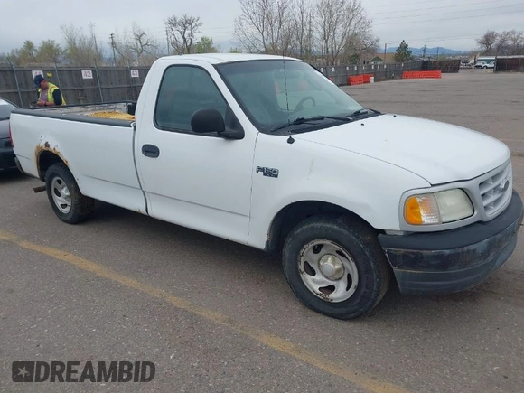 2003 Ford F-150 XL with VIN 1FTRF17273NA15637, listed as a IAAI auction lot 41952924 with 215,704 mi miles and . Bid and sale history available at DreamBid. Image 1.