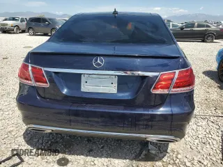 2015 Mercedes-Benz E 350 Luxury with VIN WDDHF8JB0FB133909, listed as a Copart auction lot 59902405 with 114,177 mi miles and Salvage title. Bid and sale history available at DreamBid. Image 6.