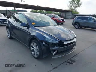 2023 Tesla Model Y Long Range with VIN 7SAYGDEEXPA078629, listed as a IAAI auction lot 42046354 with 27,245 mi miles and . Bid and sale history available at DreamBid. Image 1.