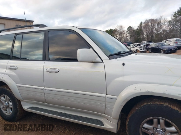 2000 Lexus LX 470 z VIN JT6HT00W9Y0103225, wystawiony jako IAAI lot #41148826 z przebiegiem 270 351 mil mil oraz . Historia ofert i sprzedaży dostępna na DreamBid. Obrazek 13.