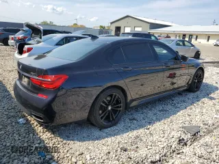 2017 BMW 7 Series with VIN WBA7F2C39HG423187, listed as a Copart auction lot 71163584 with 148,229 mi miles and Non Repairable. Bid and sale history available at DreamBid. Image 3.