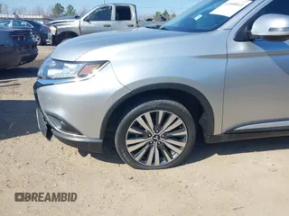 2020 Mitsubishi Outlander ES z VIN JA4AZ3A38LZ024741, wystawiony jako IAAI lot #41599013 z przebiegiem 184 469 mil mil oraz . Historia ofert i sprzedaży dostępna na DreamBid. Obrazek 6.