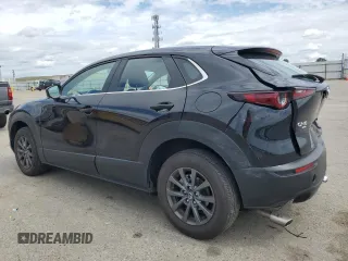 2023 Mazda CX-30 S with VIN 3MVDMBAM7PM555455, listed as a Copart auction lot 51268345 with 34,552 mi miles and Salvage Title. Bid and sale history available at carsss.com. Image 2.