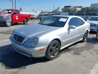 2002 Mercedes-Benz CLK 320/430 with VIN WDBLJ70G92T127992, listed as a IAAI auction lot 41862108 with 196,205 mi miles and . Bid and sale history available at DreamBid. Image 2.