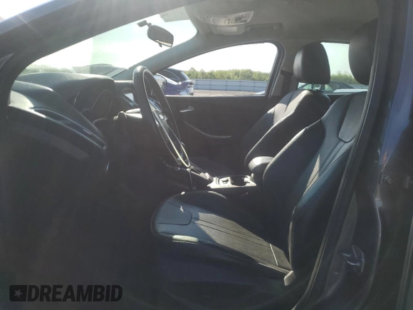 2014 Ford Focus Titanium with VIN 1FADP3N24EL269008, listed as a Copart auction lot 56396975 with 116,856 mi miles and Salvage title. Bid and sale history available at DreamBid. Image 7.