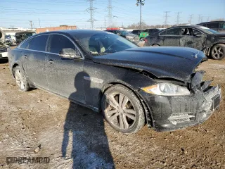 2014 Jaguar XJ with VIN SAJWJ2GD6E8V73491, listed as a Copart auction lot 42472345 with 68,747 mi miles and Salvage Title. Bid and sale history available at carsss.com. Image 4.