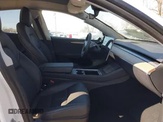 2022 Tesla Model Y Performance with VIN 7SAYGDEF5NF542189, listed as a IAAI auction lot 41643254 with 18,865 mi miles and . Bid and sale history available at DreamBid. Image 5.