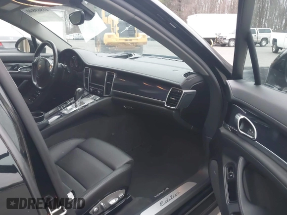 2016 Porsche Panamera 4 z VIN WP0AA2A72GL005752, wystawiony jako IAAI lot #41869840 z przebiegiem 114 719 mil mil oraz . Historia ofert i sprzedaży dostępna na DreamBid. Obrazek 5.