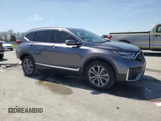2021 Honda CR-V Touring z VIN 5J6RW2H94ML019220, wystawiony jako Copart lot #51437405 z przebiegiem 35 362 mil mil oraz Czysty tytuł • Clean title. Historia ofert i sprzedaży dostępna na DreamBid. Obrazek 4.