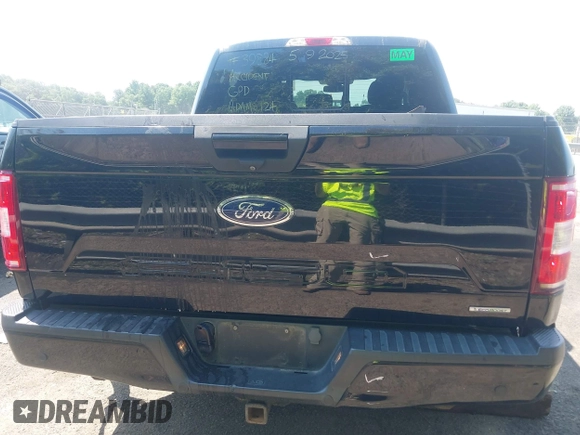 2018 Ford F-150 XL with VIN 1FTEW1EP2JFD51393, listed as a IAAI auction lot 42307408 with 141,478 mi miles and . Bid and sale history available at DreamBid. Image 16.