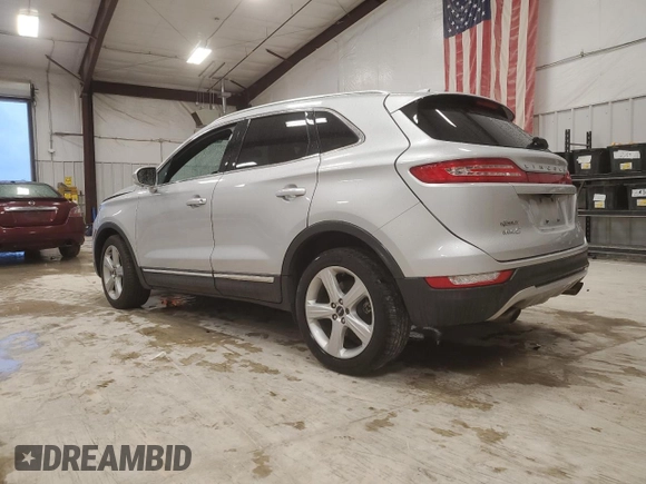 2018 Lincoln MKC Premiere with VIN 5LMCJ1C90JUL07472, listed as a Copart auction lot 50595015 with 74,989 mi miles and Salvage Title. Bid and sale history available at DreamBid. Image 2.