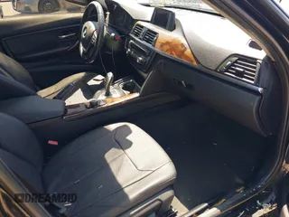 2015 BMW 3 Series 328i with VIN WBA3C1C58FK123489, listed as a IAAI auction lot 42026400 with 127,880 mi miles and . Bid and sale history available at carsss.com. Image 5.