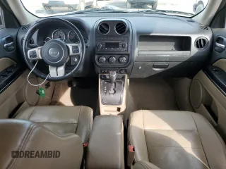 2011 Jeep Patriot Latitude X with VIN 1J4NF4GB4BD167258, listed as a Copart auction lot 52239874 with 157,144 mi miles and Salvage Title. Bid and sale history available at DreamBid. Image 8.
