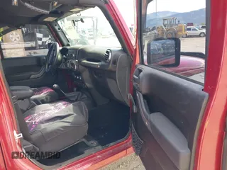 2012 Jeep Wrangler Unlimited Sport z VIN 1C4BJWDG8CL258625, wystawiony jako IAAI lot #42266102 z przebiegiem 58 594 mil mil oraz . Historia ofert i sprzedaży dostępna na DreamBid. Obrazek 5.