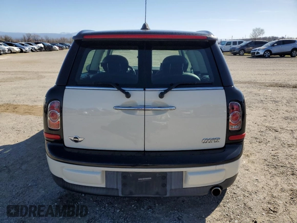 2013 MINI Clubman z VIN WMWZF3C57DT490520, wystawiony jako Copart lot #45781245 z przebiegiem 110 017 mil mil oraz Szkoda całkowita • Salvage title. Historia ofert i sprzedaży dostępna na DreamBid. Obrazek 6.