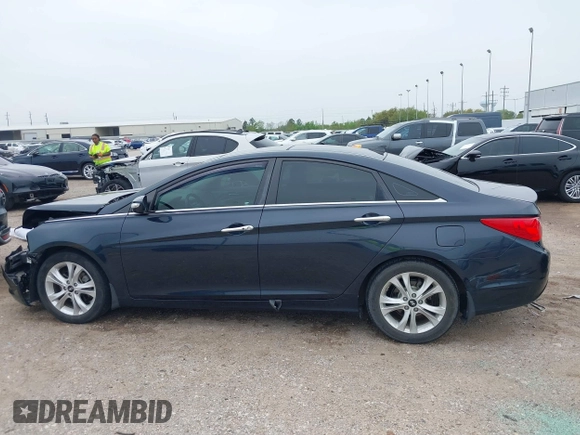 2012 Hyundai Sonata SE z VIN 5NPEC4AC7CH341786, wystawiony jako IAAI lot #41890326 z przebiegiem 114 678 mil mil oraz . Historia ofert i sprzedaży dostępna na DreamBid. Obrazek 15.