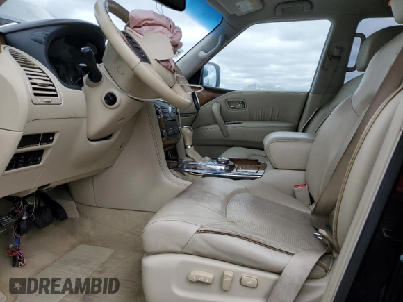 2012 Infiniti QX56 7-passenger z VIN JN8AZ2NE5C9021621, wystawiony jako Copart lot #53484825 z przebiegiem 139 453 mil mil oraz Szkoda całkowita • Salvage title. Historia ofert i sprzedaży dostępna na DreamBid. Obrazek 7.