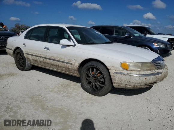 1998 Lincoln Continental with VIN 1LNFM97V5WY637895, listed as a Copart auction lot 77020154 with 0 mi miles and Salvage Title. Bid and sale history available at carsss.com. Image 4.