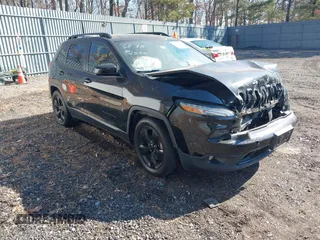2016 Jeep Cherokee Latitude with VIN 1C4PJLCSXGW140977, listed as a IAAI auction lot 41650459 with 99,495 mi miles. Bid and sale history available at carsss.com. Image 1.