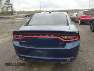 2015 Dodge Charger SXT with VIN 2C3CDXHG5FH878642, listed as a IAAI auction lot 42035569 with 228,000 mi miles and . Bid and sale history available at DreamBid. Image 16.