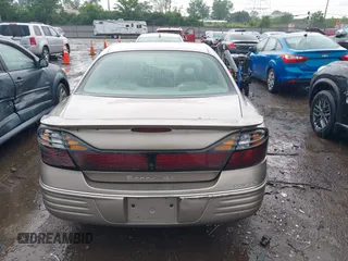 2001 Pontiac Bonneville SE z VIN 1G2HX54K814258899, wystawiony jako IAAI lot #42260783 z przebiegiem 165 869 mil mil oraz . Historia ofert i sprzedaży dostępna na DreamBid. Obrazek 16.