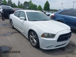 2013 Dodge Charger SE with VIN 2C3CDXFG7DH568461, listed as a IAAI auction lot 42025979 with 187,076 mi miles and . Bid and sale history available at carsss.com. Image 1.