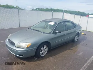 2005 Ford Taurus SE with VIN 1FAFP53U55A209369, listed as a IAAI auction lot 42144800 with 152,446 mi miles. Bid and sale history available at carsss.com. Image 2.
