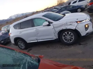2019 Hyundai Santa Fe SE with VIN 5NMS23AD9KH077362, listed as a IAAI auction lot 41890584 with 132,476 mi miles. Bid and sale history available at carsss.com. Image 13.