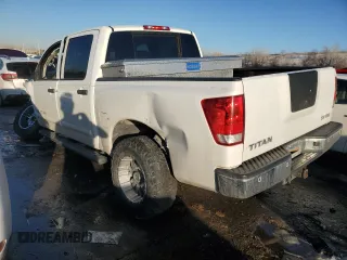 2012 Nissan Titan SV with VIN 1N6AA0EC1CN326088, listed as a Copart auction lot 42799335 with 163,218 mi miles and Salvage Title. Bid and sale history available at carsss.com. Image 2.