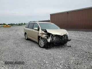 2012 Toyota Sienna XLE with VIN 5TDDK3DC1CS047265, listed as a Copart auction lot 58500275 with 203,548 mi miles and Salvage title. Bid and sale history available at DreamBid. Image 14.