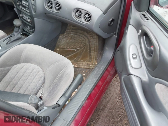2003 Pontiac Bonneville SE with VIN 1G2HX52KX34189218, listed as a IAAI auction lot 41712101 with 131,351 mi miles and . Bid and sale history available at DreamBid. Image 5.