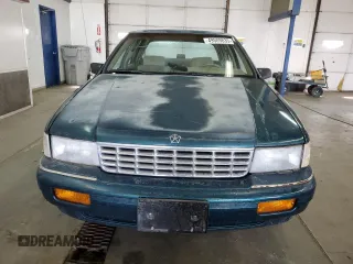 1994 Plymouth Acclaim z VIN 3P3AA46K7RT276936, wystawiony jako Copart lot #49509835 z przebiegiem 176 324 mil mil oraz Tytuł czysty. Historia ofert i sprzedaży dostępna na DreamBid. Obrazek 5.