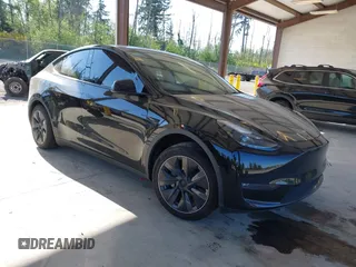 2023 Tesla Model Y Long Range z VIN 7SAYGDEE4PF694216, wystawiony jako IAAI lot #42180693 z przebiegiem 29 303 mil mil oraz . Historia ofert i sprzedaży dostępna na DreamBid. Obrazek 1.