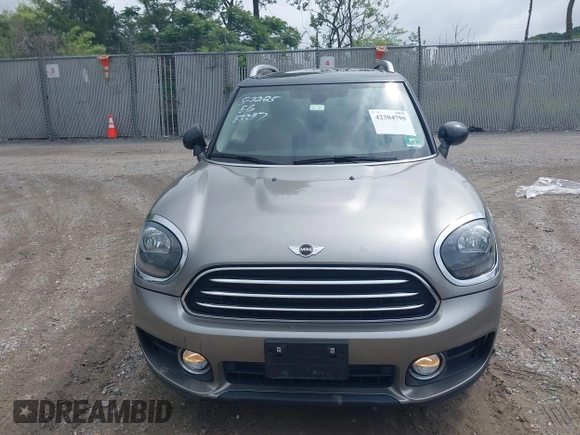 2018 MINI Countryman Cooper z VIN WMZYV5C39J3E02982, wystawiony jako IAAI lot #42384795 z przebiegiem 74 599 mil mil oraz . Historia ofert i sprzedaży dostępna na DreamBid. Obrazek 12.