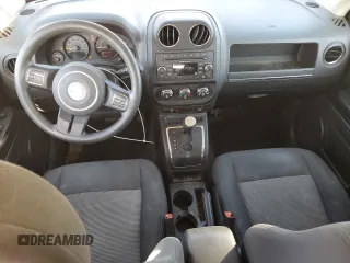 2014 Jeep Patriot Altitude with VIN 1C4NJPBA3ED818713, listed as a Copart auction lot 52256865 with 135,274 mi miles and Salvage title. Bid and sale history available at DreamBid. Image 8.