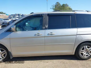 2005 Honda Odyssey EX-L z VIN 5FNRL38715B014905, wystawiony jako IAAI lot #41986395 z przebiegiem 191 029 mil mil oraz . Historia ofert i sprzedaży dostępna na DreamBid. Obrazek 14.