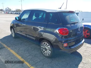 2014 FIAT 500L Lounge with VIN ZFBCFACH1EZ029757, listed as a IAAI auction lot 41643494 with 49,910 mi miles and . Bid and sale history available at DreamBid. Image 3.