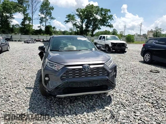 2019 Toyota RAV4 Hybrid XSE with VIN JTMEWRFV4KJ004271, listed as a Copart auction lot 61335175 with 116,457 mi miles and Salvage title. Bid and sale history available at DreamBid. Image 14.