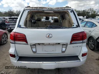 2015 Lexus LX 570 with VIN JTJHY7AX7F4169804, listed as a Copart auction lot 79885024 with 55,392 mi miles and Salvage Title. Bid and sale history available at DreamBid. Image 6.