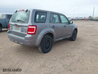 2008 Ford Escape XLS with VIN 1FMCU02Z58KA18082, listed as a IAAI auction lot 41957377 with 141,200 mi miles. Bid and sale history available at carsss.com. Image 4.