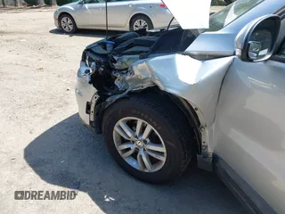 2012 Volkswagen Tiguan SE z VIN WVGAV7AX8CW542695, wystawiony jako IAAI lot #42270445 z przebiegiem 125 419 mil mil oraz . Historia ofert i sprzedaży dostępna na DreamBid. Obrazek 6.