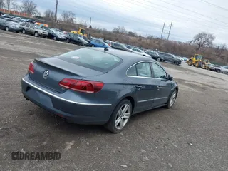 2013 Volkswagen CC Sport with VIN WVWBP7AN8DE513898, listed as a IAAI auction lot 41694857 with 67,440 mi miles. Bid and sale history available at carsss.com. Image 4.