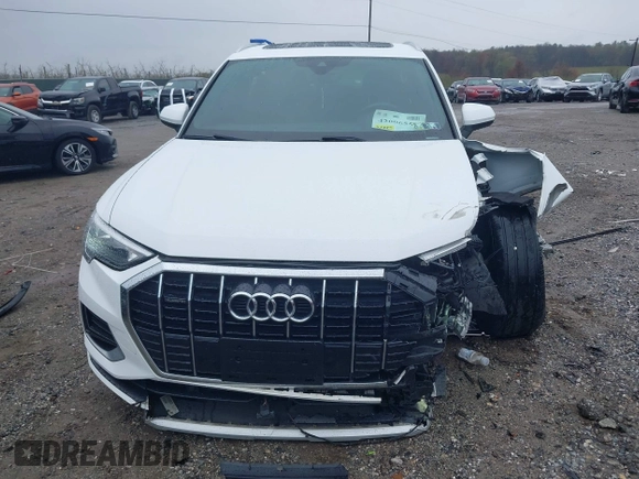 2020 Audi Q3 Premium with VIN WA1AECF35L1030273, listed as a IAAI auction lot 42006553 with 81,944 mi miles. Bid and sale history available at carsss.com. Image 12.