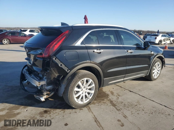 2023 Cadillac XT4 FWD Luxury z VIN 1GYAZAR42PF102696, wystawiony jako Copart lot #85540204 z przebiegiem 1 903 mil mil oraz Szkoda całkowita • Salvage title. Historia ofert i sprzedaży dostępna na DreamBid. Obrazek 3.