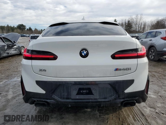 2024 BMW X4 M40i with VIN 5UX43DT00R9T40316, listed as a Copart auction lot 46582885 with 9,335 mi miles and Salvage Title. Bid and sale history available at carsss.com. Image 6.