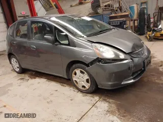 2013 Honda Fit with VIN JHMGE8H30DC027988, listed as a IAAI auction lot 41554794 with 69,931 mi miles. Bid and sale history available at carsss.com. Image 1.