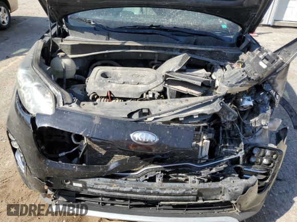 2018 Kia Sportage EX z VIN KNDPN3AC8J7450904, wystawiony jako Copart lot #76091074 z przebiegiem 104 850 mil mil oraz Szkoda całkowita • Salvage title. Historia ofert i sprzedaży dostępna na DreamBid. Obrazek 12.