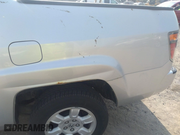 2007 Honda Ridgeline RTL z VIN 2HJYK16537H501200, wystawiony jako IAAI lot #42425662 z przebiegiem 188 618 mil mil oraz . Historia ofert i sprzedaży dostępna na DreamBid. Obrazek 19.