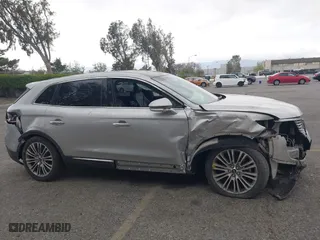 2016 Lincoln MKX Reserve with VIN 2LMTJ8LR3GBL52307, listed as a IAAI auction lot 35271548 with 55,940 mi miles. Bid and sale history available at carsss.com. Image 13.